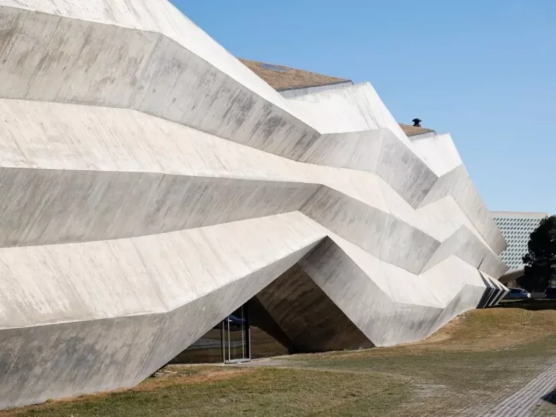 Sculptural white architecture under a blue sky in Tbilisi, Georgia
